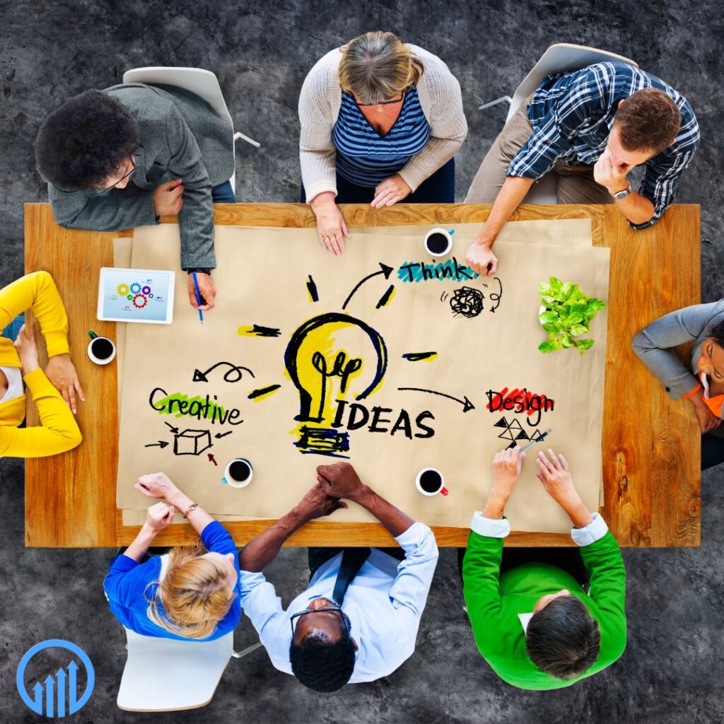 A diverse marketing team sitting around a table working on a project